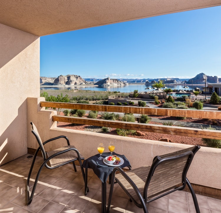 Lake Powell Resort room balcony with table and chairs and a view of Lake Powell